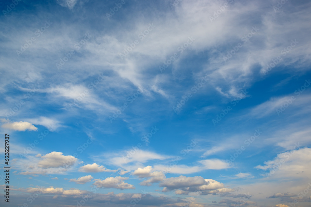 Beautiful white fluffy clouds against blue sky.