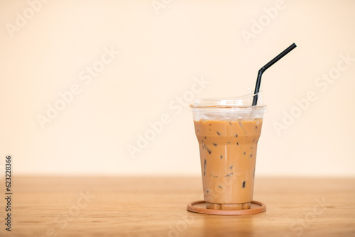 Obraz na plátně a iced coffee on wooden table with white background
