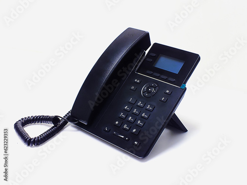 Foto Desk office phone large black keypad.