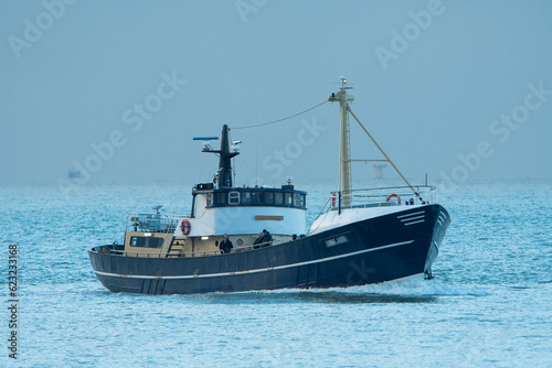 Motor Vessel 'Luna Azul' navigate near the harbour of Scheveningen, The Netheralnds