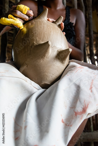 Skilled hands of potters working in the manufacture of ceramic pieces in Maragoipinho, city of Aratuipe, Bahia. photo