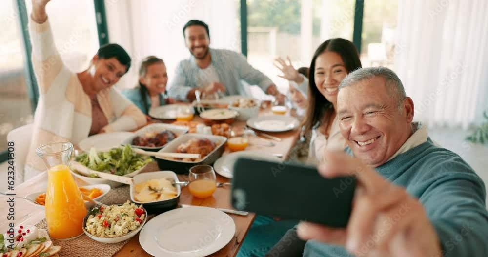 Thanksgiving, wave and video call with a grandfather and his family together for bonding in celebration. Love, lunch or brunch with a senior man and relatives taking a selfie at the dining room table Thanksgiving, wave and video call with a grandfather and his family together for bonding in celebration. Love, lunch or brunch with a senior man and relatives taking a selfie at the dining room table