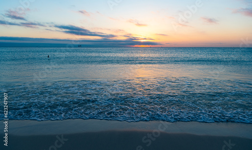 beautiful miami sunset with sea water on the summer beach