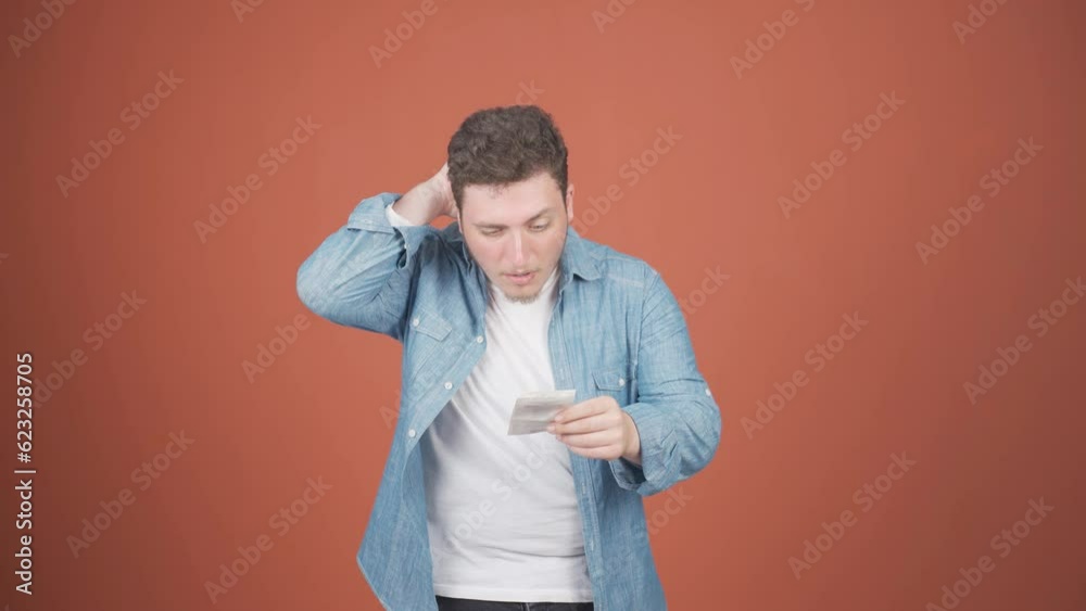 Angry man with high bill.