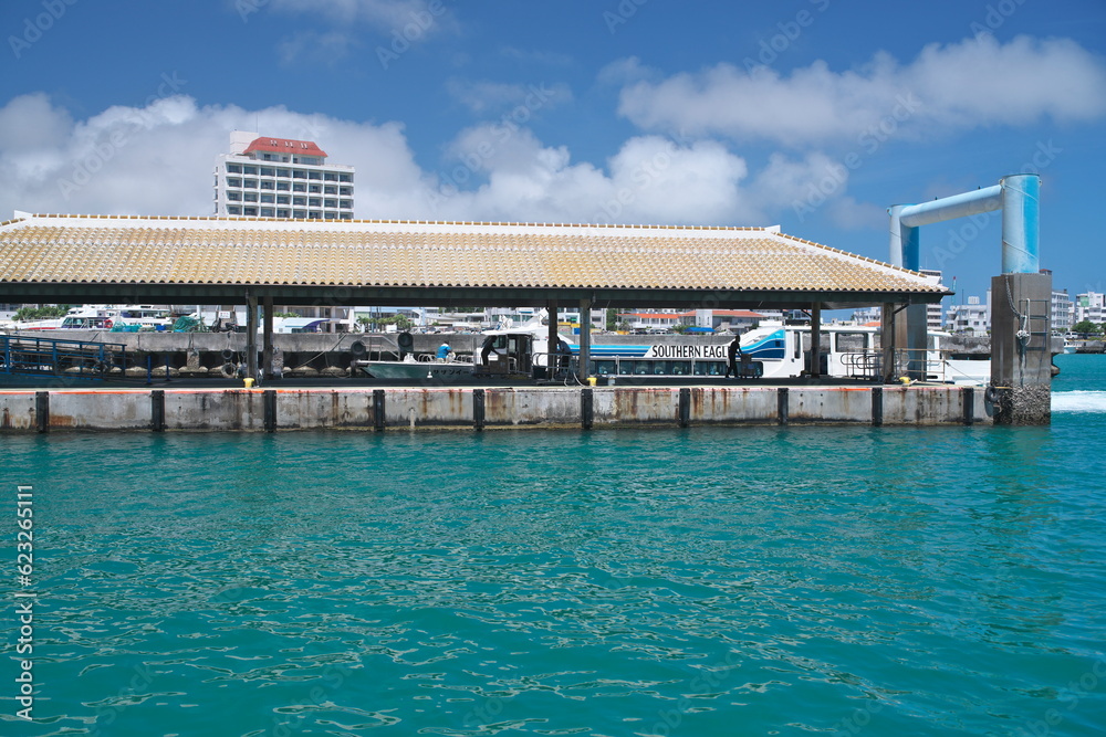 Okinawa,Japan - July 4, 2023: Floating Pier of Ishigaki Ferry Terminal in Ishigaki island, Okinawa, Japan
