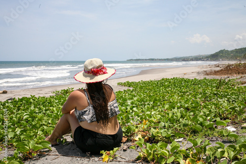 Woman enjoying her visit to the beaches of El Salvador