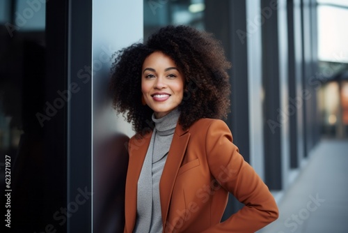 Portrait of a smiling african american businesswoman standing outside