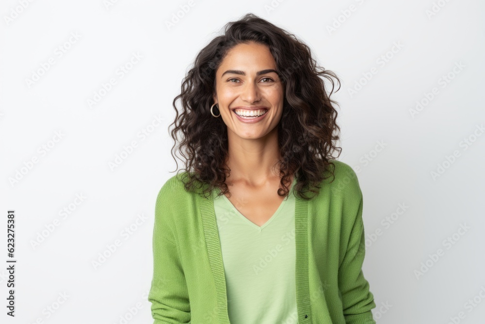 Portrait of a beautiful young woman smiling at camera over white background Portrait of a beautiful young woman smiling at camera over white background
