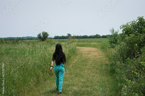 woman walking in the field