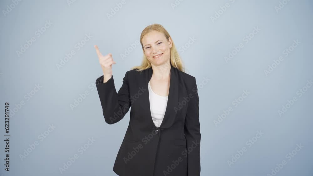 Business woman showing her mind looking at camera. Business woman showing her mind looking at camera.
