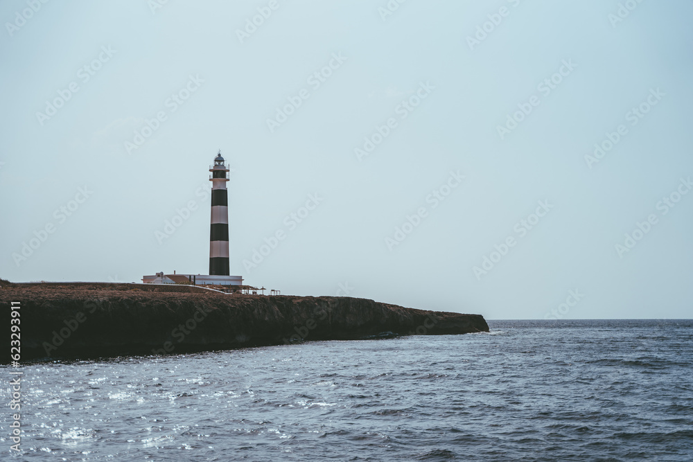 Beautiful blue white lighthouse on the Spanish island of Menorca