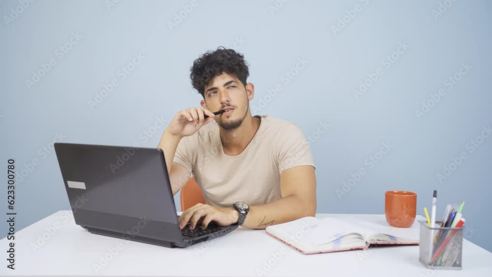 Man looking at laptop is thoughtful. Man looking at laptop is thoughtful.
