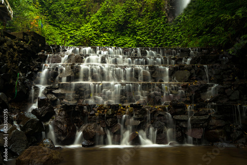 Landscape of multilevel waterfalls in Dlundung, Trawas, Mojokerto. Indonesia. photo