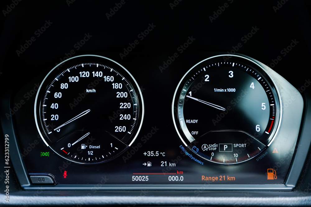 Fototapeta premium car​ instrument panel, car​ speed motor of​ night, car​ dashboard​ modern​ automobile control​illuminated panel​ speed display.