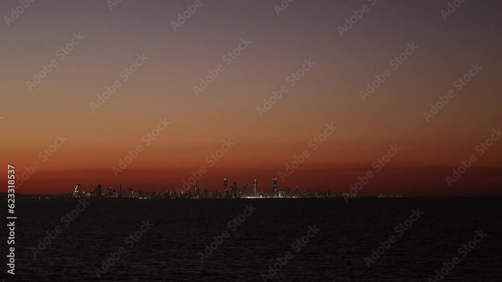 Sunset view of the Gold Coast skyline seen from Coolangatta Beach, Queensland Sunset view of the Gold Coast skyline seen from Coolangatta Beach, Queensland