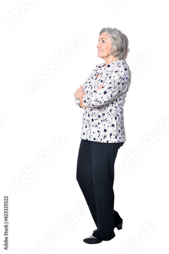 full length, happy senior woman posing isolated on white background