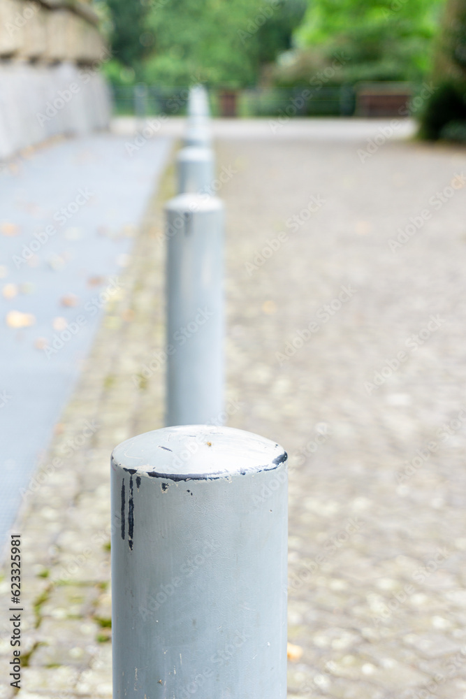 Old metal pillars on the street Old metal pillars on the street