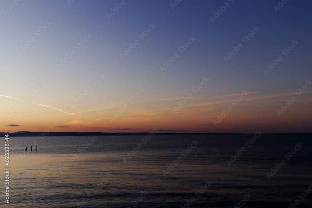 Sunset with sea and mountains