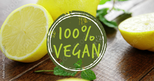 Composite of 100 percent vegan text over halved lemons