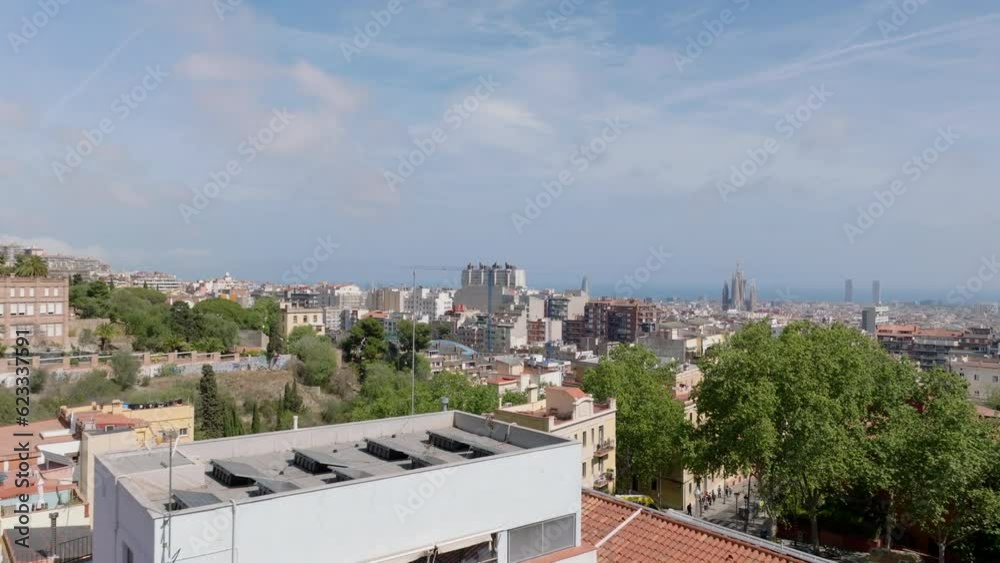 Forwards fly around balcony. Revealing wide view of town development in residential urban borough in large city. Barcelona, Spain Forwards fly around balcony. Revealing wide view of town development in residential urban borough in large city. Barcelona, Spain