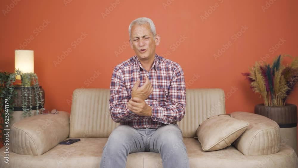 The man is suffering from joint pain. The man is suffering from joint pain.