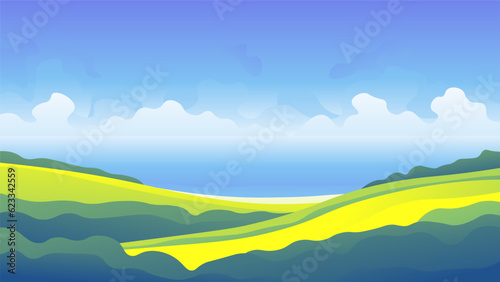 Beautiful green grassland on the sea background. Summer weather landscape.