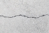 Cracked cement wall texture for background.