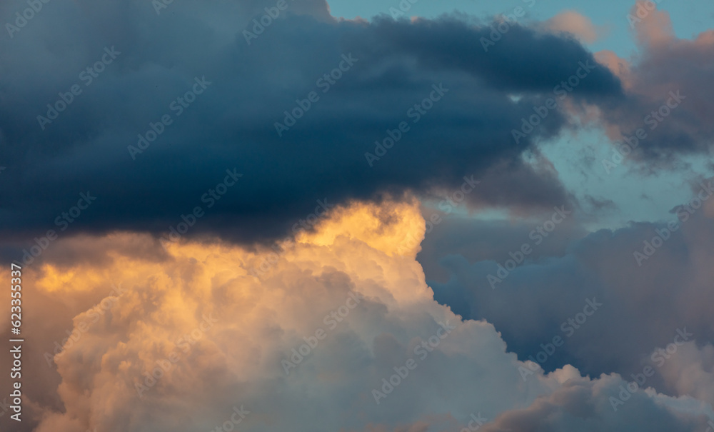 Rain clouds at sunset as background Rain clouds at sunset as background
