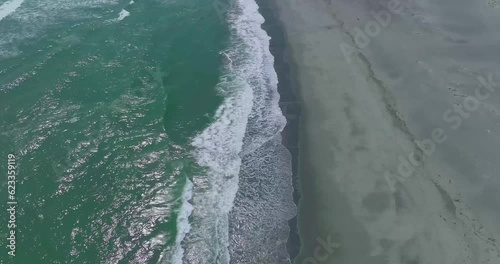 Shooting the beach of the sea with a drone from an hi level. photo