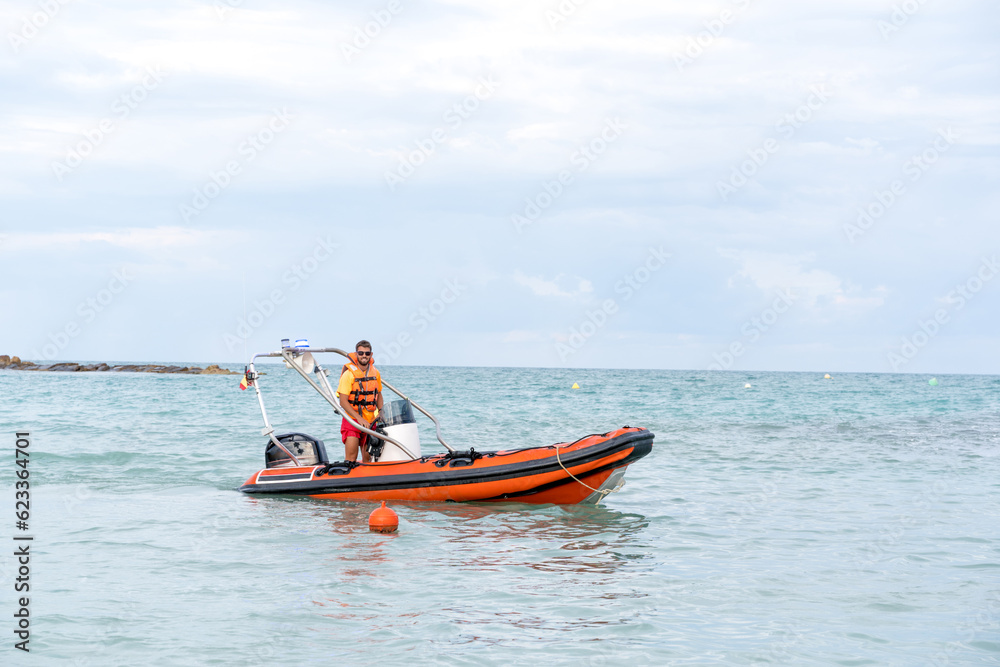 Lifeguard on a boat in the middle of the sea Lifeguard on a boat in the middle of the sea