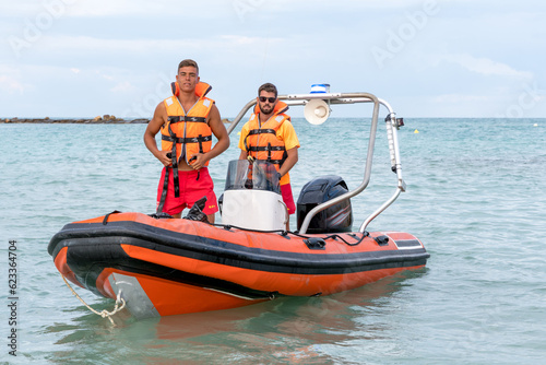Two Lifeguards on a boat in the sea