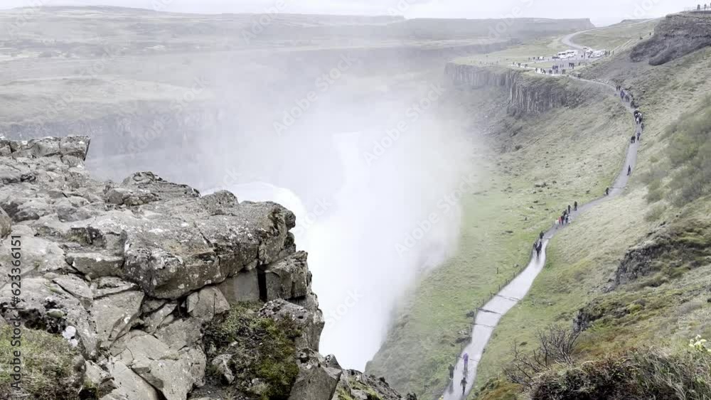 Iceland - Capture the mesmerizing dance of water and light at Iceland's Gullfoss waterfall. Iceland - Capture the mesmerizing dance of water and light at Iceland's Gullfoss waterfall.