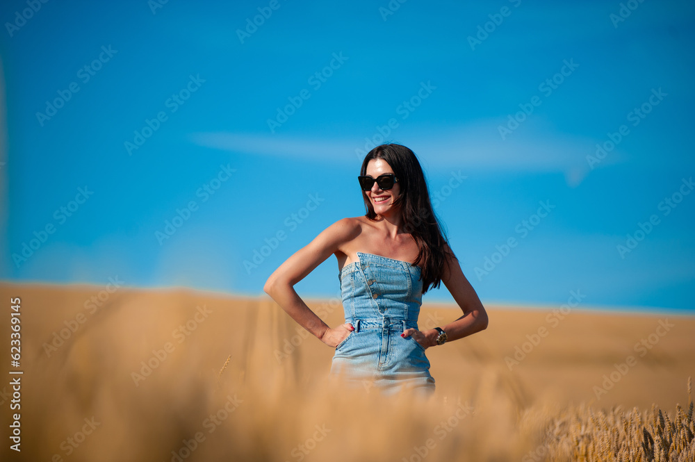 beautiful young woman in golden wheat field beautiful young woman in golden wheat field