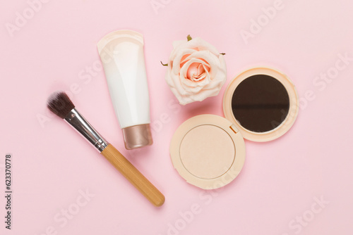 Composition with makeup products for skin tone on color background, top view