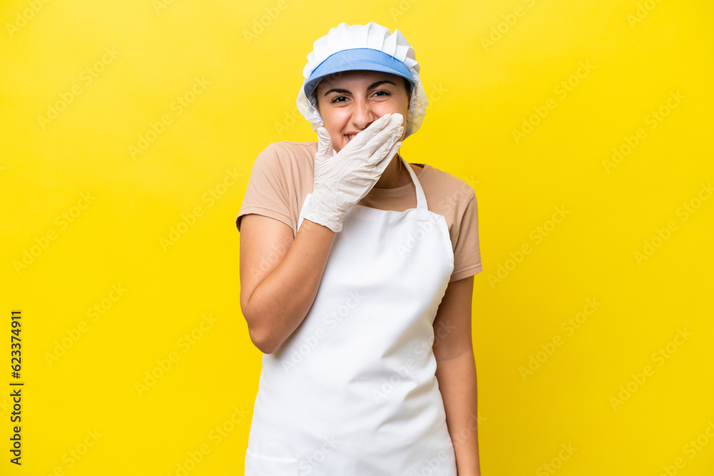 Fishwife woman over isolated background happy and smiling covering mouth with hand