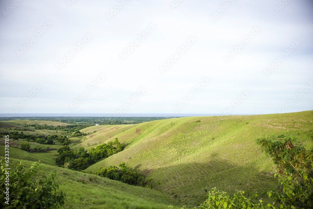 Ledongara hills, showing hills with green field in Sumba, East Nusa Tenggara, Indonesia