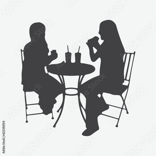 Elegant Silhouettes of Young Women Enjoying a Delightful Lunch Gathering