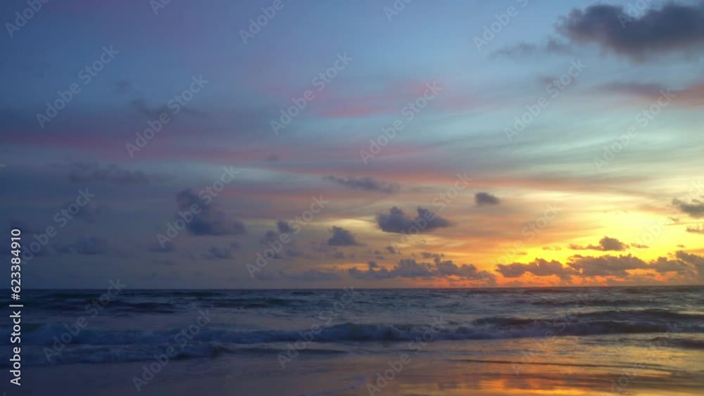 .calm sea with sunset sky and sun through the clouds over..Meditation ocean and sky background. Tranquil seascape..Reflection of yellow sky on the surface by the beach in golden sunset. gradient .calm sea with sunset sky and sun through the clouds over..Meditation ocean and sky background. Tranquil seascape..Reflection of yellow sky on the surface by the beach in golden sunset. gradient