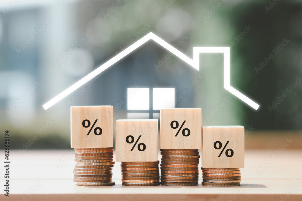 Refinance to reduce the interest of home loan. House icon on background with Percentage sign on wooden block. Mortgage, loan, repayments, credit limit, house tax, business and financial concept. - obrazy, fototapety, plakaty 