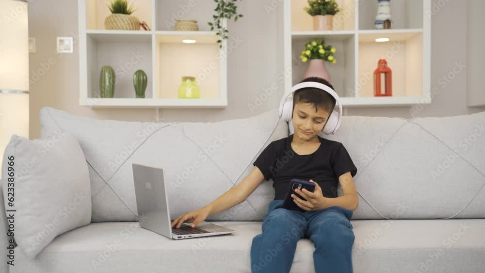 Happy smart boy working with technological materials. Happy smart boy working with technological materials.