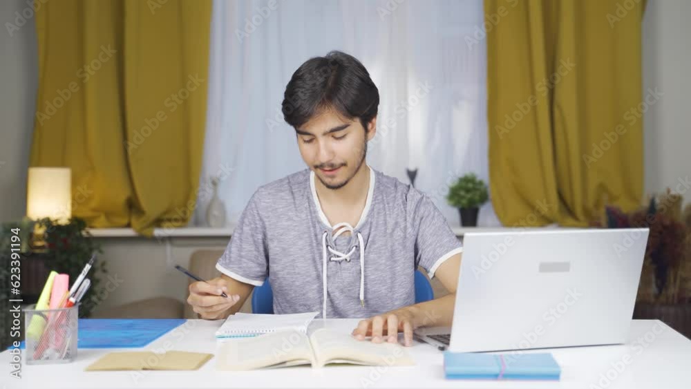 Male student looking at camera with negative and negative gesture. Male student looking at camera with negative and negative gesture.