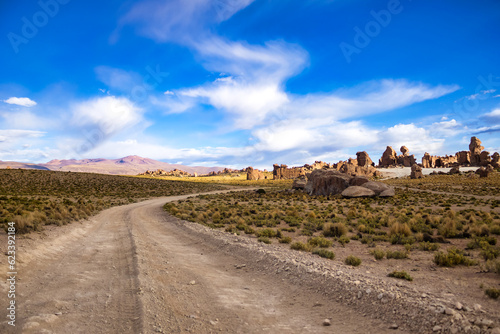 Landscape photo of wild nature mountains of Bolivia with countryside road  sunny summer day. Scenic view of bolivian natural wilderness. Global ecology concept. Copy ad text space  nature backgrounds