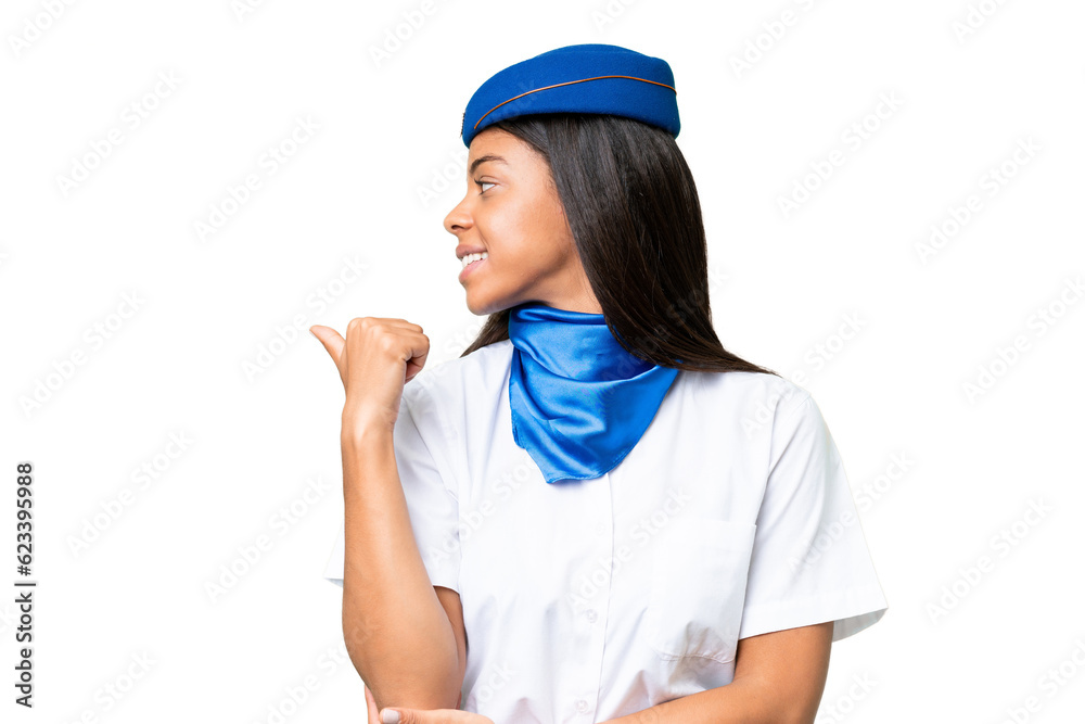 Airplane stewardess African american woman over isolated background pointing to the side to present a product Airplane stewardess African american woman over isolated background pointing to the side to present a product