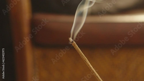 Burning Incense Stick Closeup View of Spiritual Fragrant Smoke in Focus