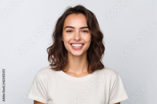 Medium shot portrait photography of a satisfied girl in her 30s wearing a casual short-sleeve shirt against a white background. With generative AI technology © Markus Schröder