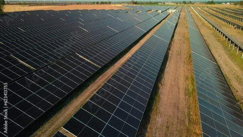 drone approach sola panel in big farm photovoltaic base station for green renewable energy supply production 