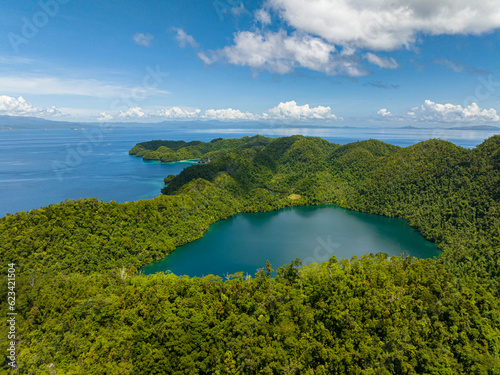 Beautiful Lagoon in Bucas Grande. Blue sky and clouds. Turquoise water surface. Surigao del Norte. Mindanao, Philippines.