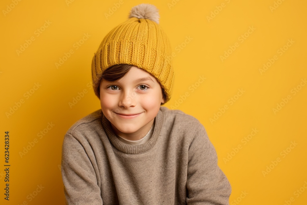 Lifestyle portrait photography of a beautiful boy in his 30s wearing a warm beanie or knit hat against a pastel yellow background. With generative AI technology Lifestyle portrait photography of a beautiful boy in his 30s wearing a warm beanie or knit hat against a pastel yellow background. With generative AI technology