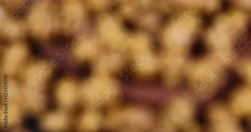 focus on delicious sweet popcorn with lots of caramel, caramel flavor of popcorn close-up photo