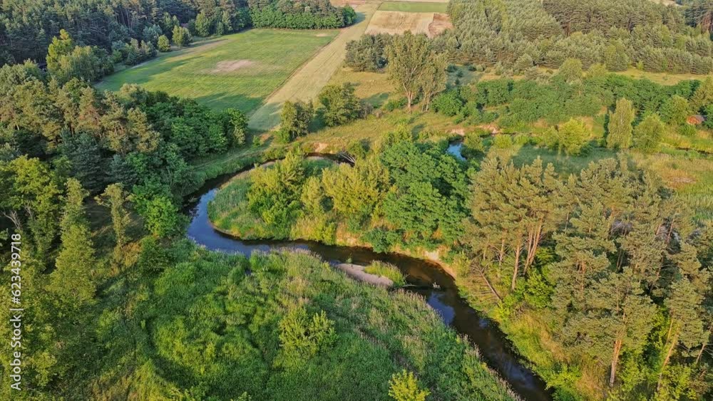 The small winding river Grabia in central Poland. The small winding river Grabia in central Poland.